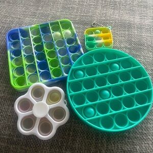Set of (4) Pop fidget toys excellent condition